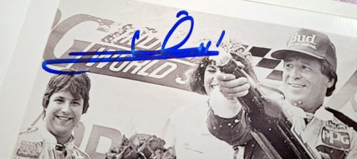 Mario Andretti (F1 Bajnok) autóversenyző aláírása hitelesítéssel fotón